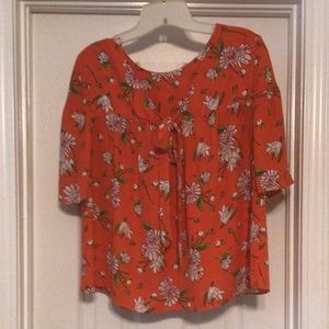 Floral pull over top